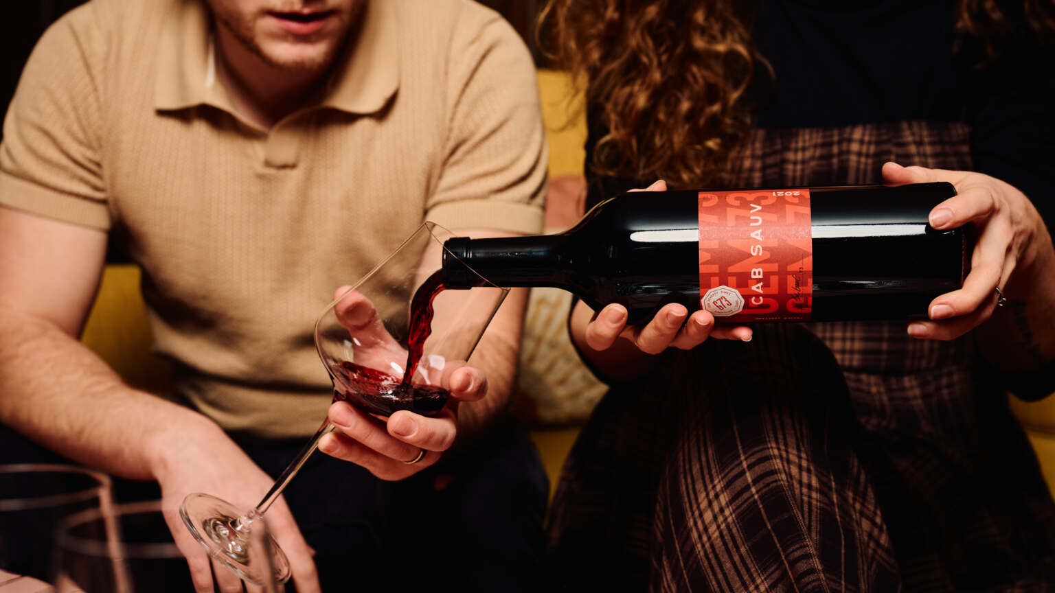 Pouring a glass of wine